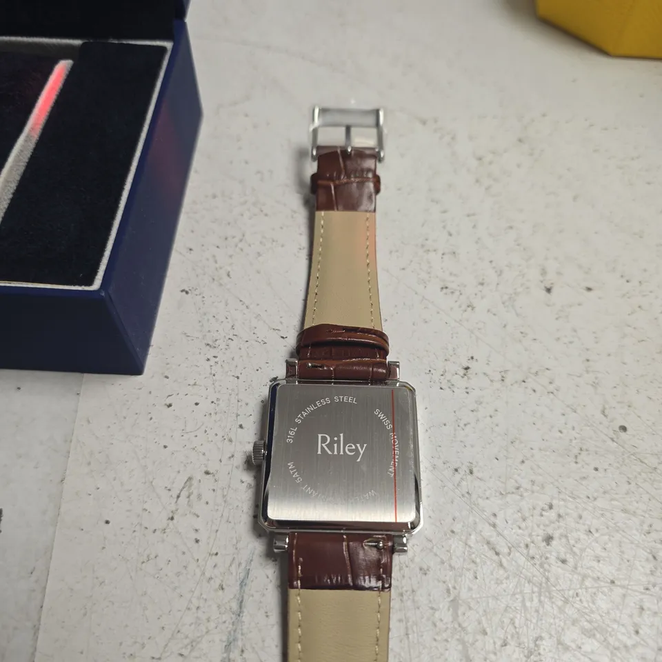 RILEY WATCH CO. RECTANGULAR STAINLESS STEEL WRISTWATCH WITH BROWN LEATHER STRAP (BOXED)