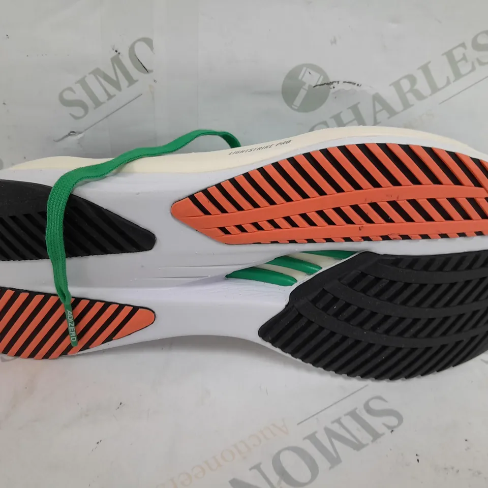 PAIR OF ADIDAS CONTINENTALS LIGHTSTRIKE PRO TRAINERS IN GREEN/NAVY/CREAM - UK 6