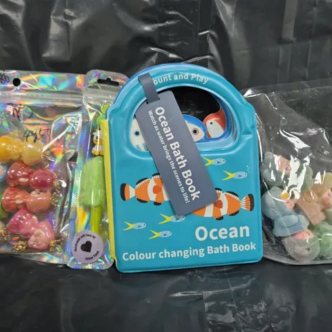 APPROXIMATELY 10 ASSORTED TOYS AND GAMES TO INCLUDE OCEAN COLOUR CHANGING BATH BOOK, ETC