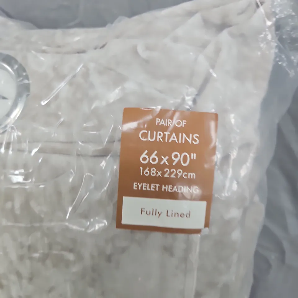 PAIR OF CREAM EYELET CURTAINS – 66X90 INCHES (168X229 CM) – FULLY LINED
