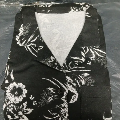 APPROXIMATELY 30 LADIES FLANNEL PYJAMAS - BLACK FLOWER - SIZES MAY VARY