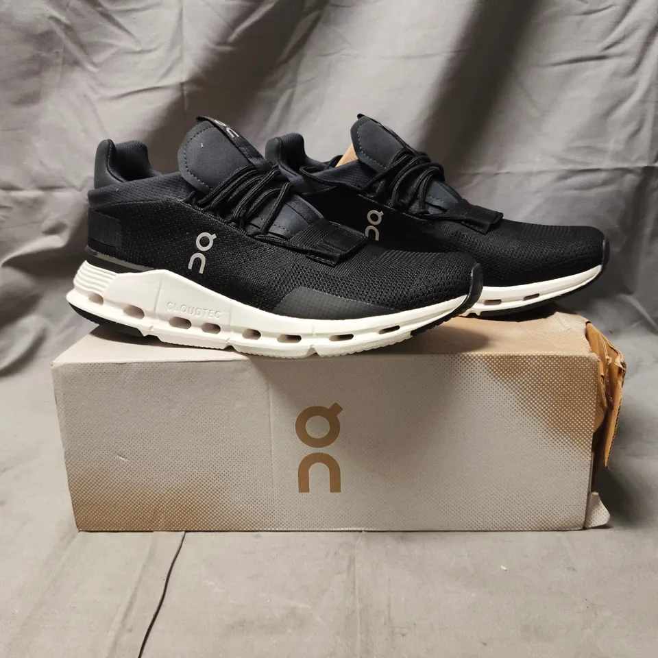 BOXED PAIR OF ON CLOUDNOVA SHOES IN PHANTOM/WHITE SIZE UK 7.5