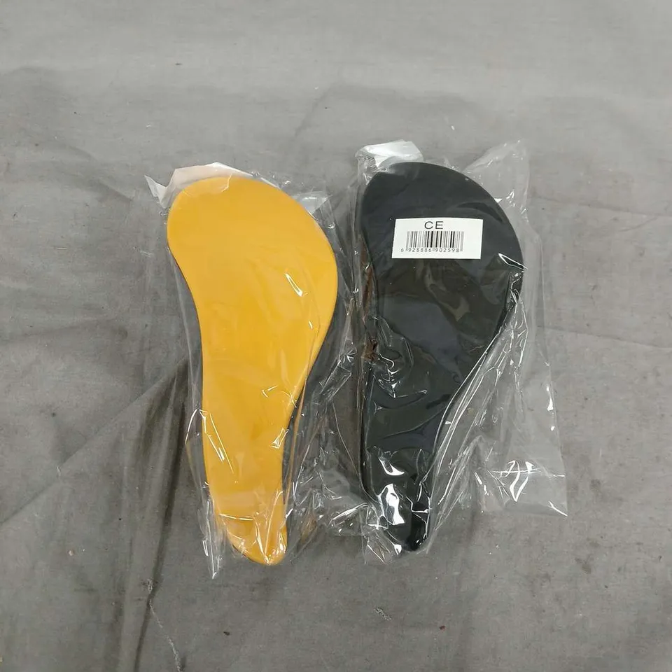 BOX OF APPROX 50 HAIRBRUSHES IN ASSORTED COLOURS