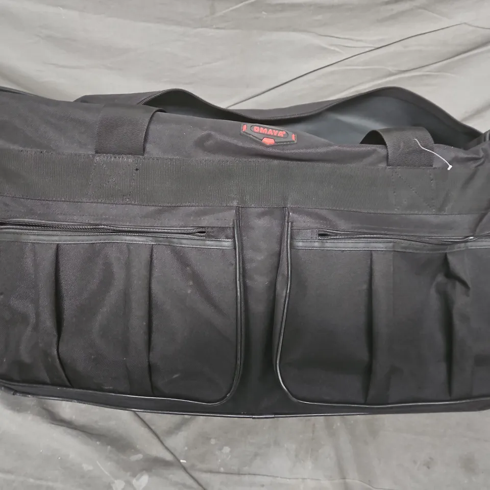 Black soft-sided travel bag with front zip pockets