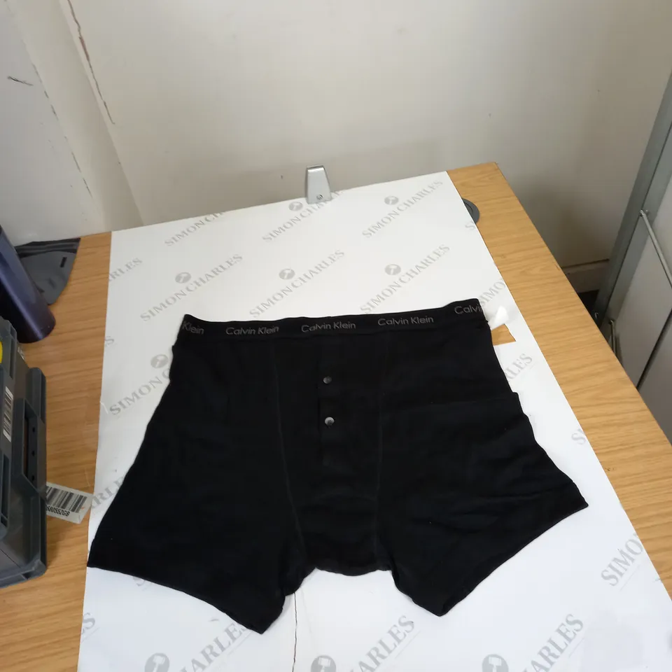 box of assorted clothing items socks, boxers, jumpers etc