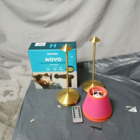 CAGE OF APPROXIMATELY 12 ASSORTED ITEMS TO INCLUDE MASSAGE GUN, LAMP, BATH PILLOWS ETC