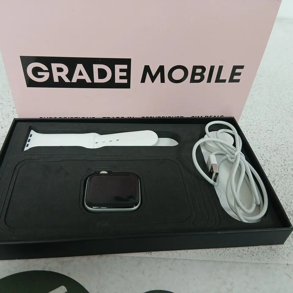 GRADE MOBILE SMARTWATCH WITH WHITE BAND – BOXED (USB CABLE INCLUDED)