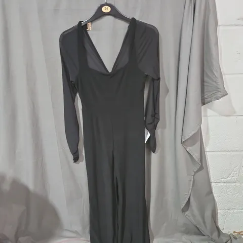 CLUB L LONDON BLACK FLARED-LEG JUMPSUIT WITH SHEER SLEEVES – UK 12