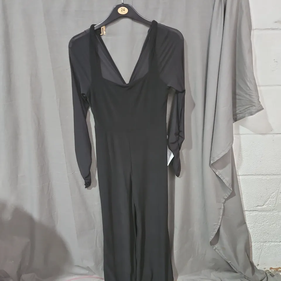 CLUB L LONDON BLACK FLARED-LEG JUMPSUIT WITH SHEER SLEEVES – UK 12