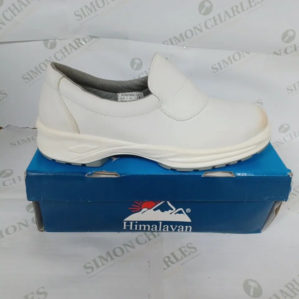 BOXED PAIR OF WHITE SLIP ON SHOES SIZE 12