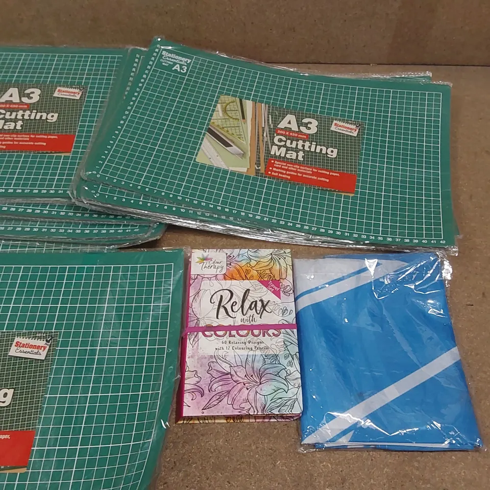 BOX CONTAINING APPROXIMATELY 28x BRAND NEW A3 CUTTING MATS, 1x COLOUR THERAPY SET, 1x FLAG