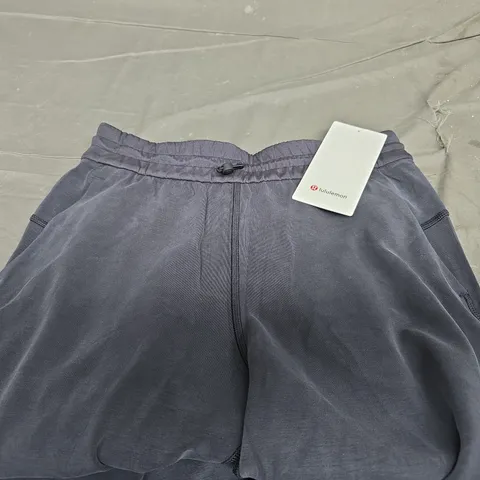 LULULEMON SOFTSTREME HIGHT RISE PANT REGULAR IN NAVY SIZE 31"