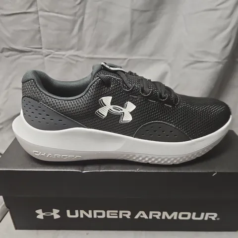 BOXED UNDER ARMOUR CHARGED SURGE 4 RUNNING SHOES – MEN'S, UK9 (US10), BLACK/GRAY