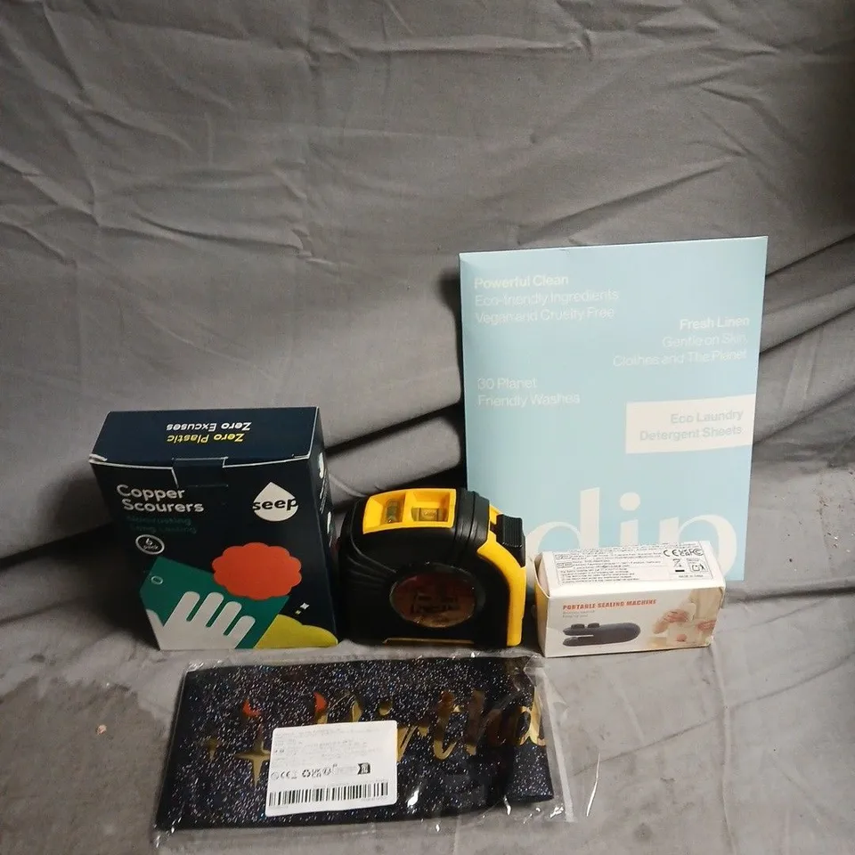 APPROXIMATELY 15 ASSORTED HOUSEHOLD ITEMS TO INCLUDE COPPER SCOURERS, DIP DETERGENT SHEETS AND PORTABLE SEALING MACHINE