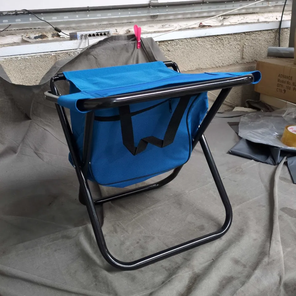FOLDABLE CHAIR WITH BLUE STORAGE BAG ON BLACK METAL FRAME