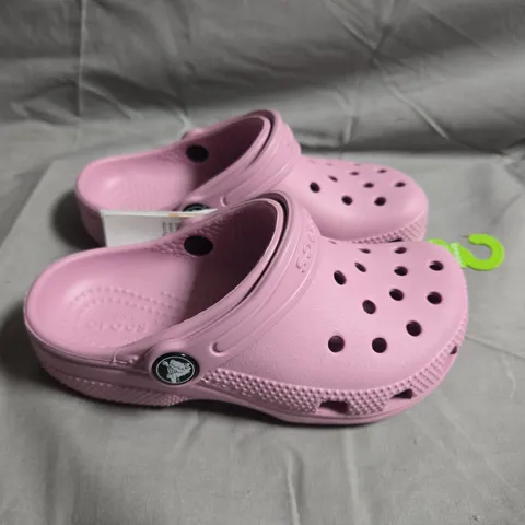 PAIR OF CROCS KIDS' PINK CLOGS WITH BACK STRAP – UK SIZE C11