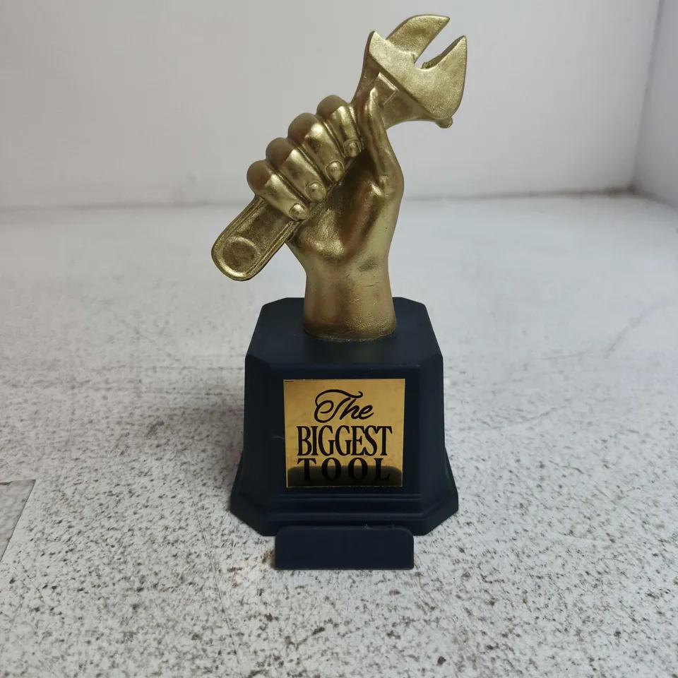 BOX OF APPROXIMATELY 45 X "THE BIGGEST TOOL" NOVELTY TROPHY