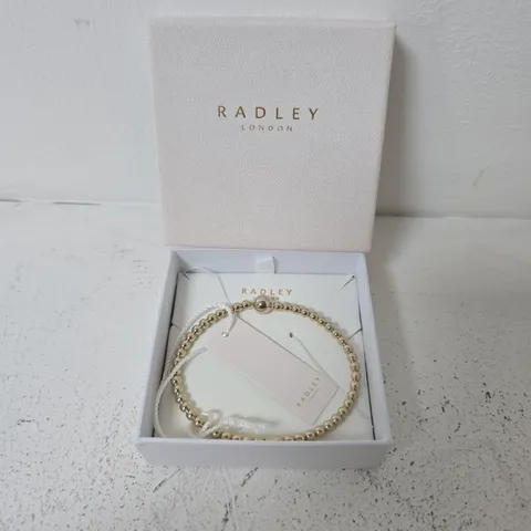 BOXED RADLEY 18CT GOLD PLATED BEAD HINGED BANGLE