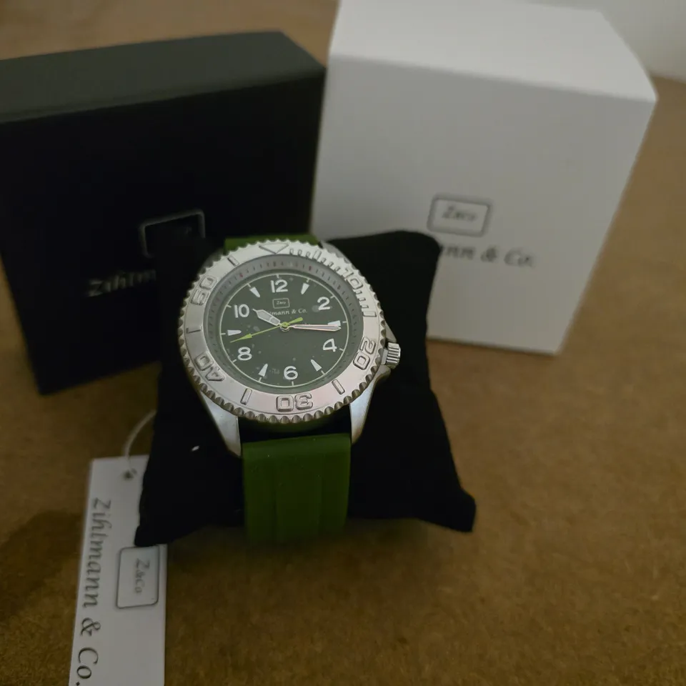 ZIHLMANN AND CO GREEN DIAL WRISTWATCH WITH SILVER CASE AND GREEN SILICONE STRAP – BOXED