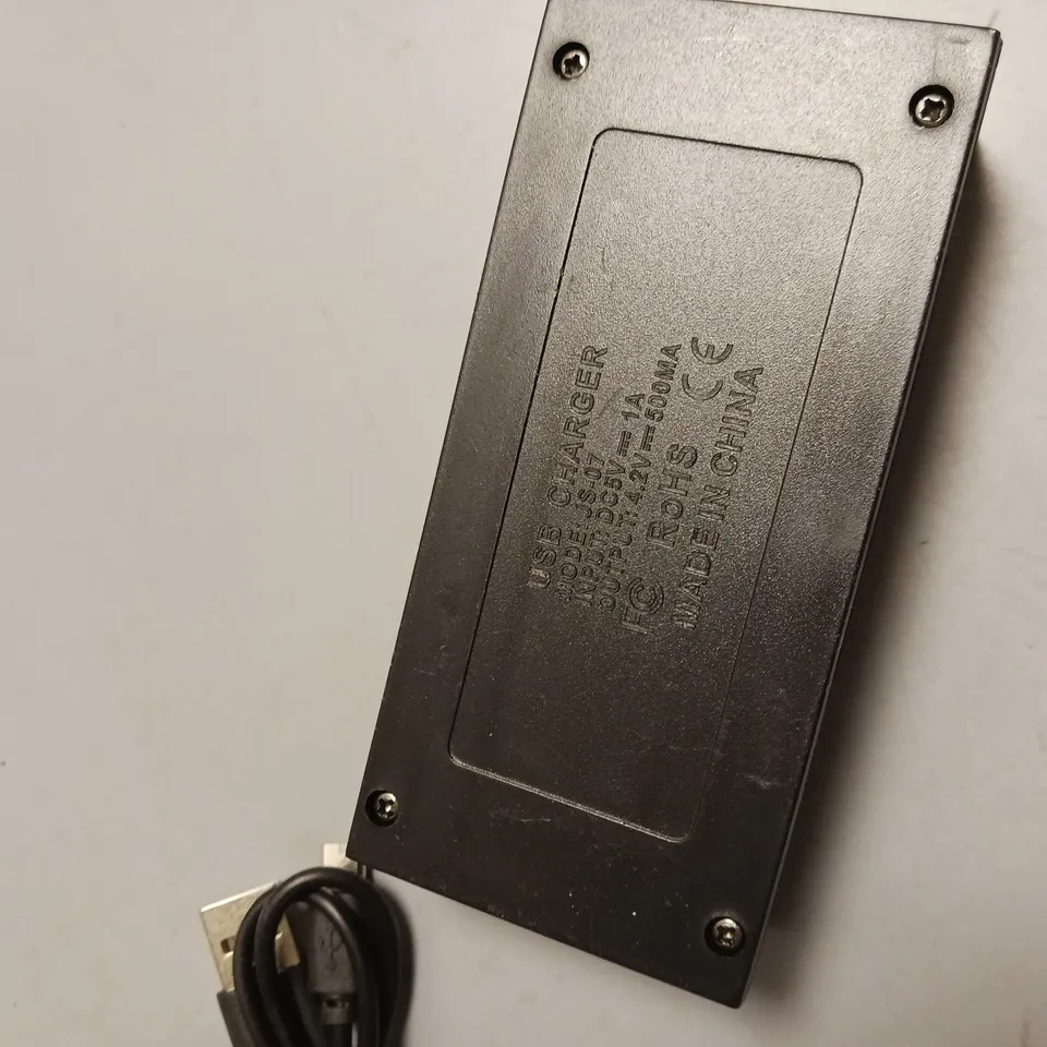 UNBRANDED USB BATTERY RECHARGER INCLUDES CHARGING CABLE