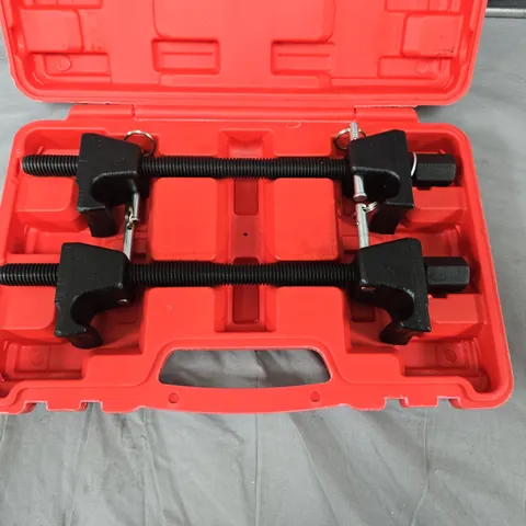 Two-rod screw clamp puller set in red case