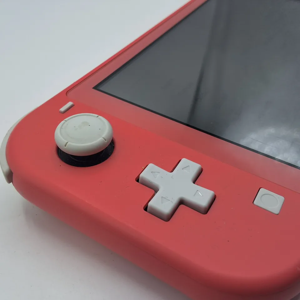 UNBOXED NINTENDO SWITCH LITE IN BLUSH WITH UNIFORM NUMSKULL CASE -HDH-001
