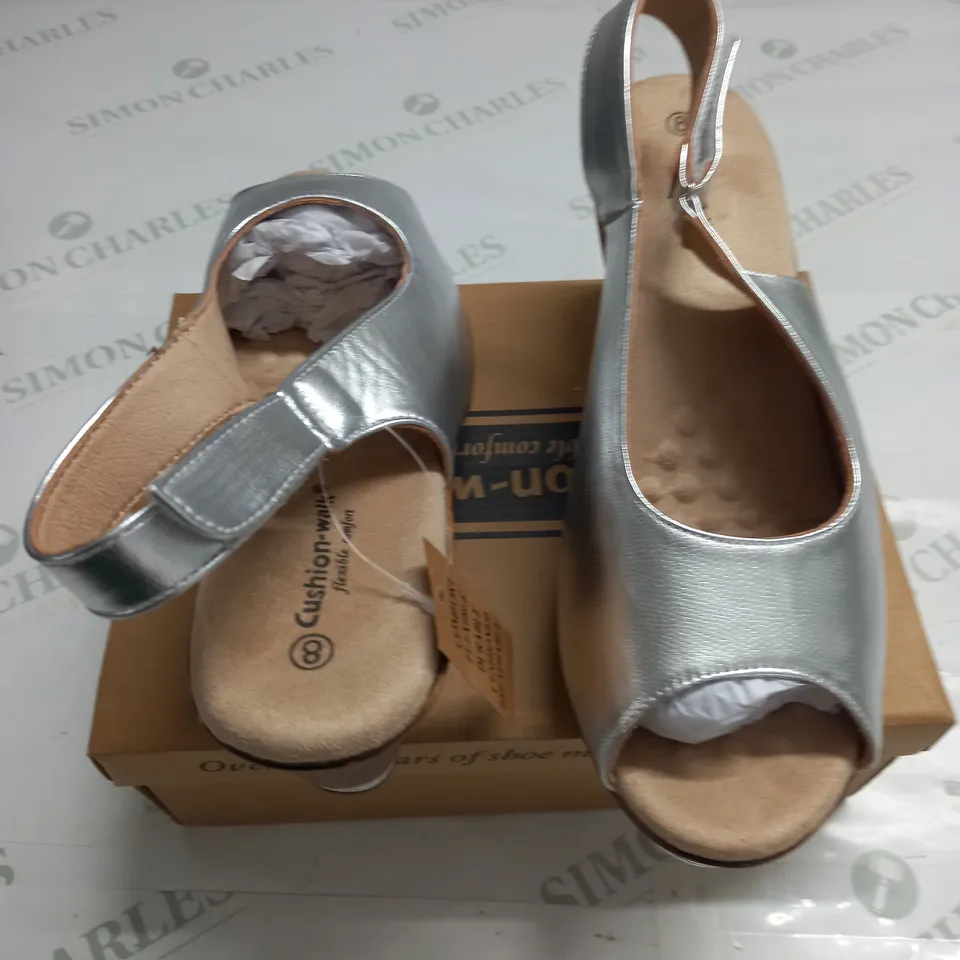 BOXED PAIR OF CUSHION WALK SILVER WEDGE HEELED SHOES - 8