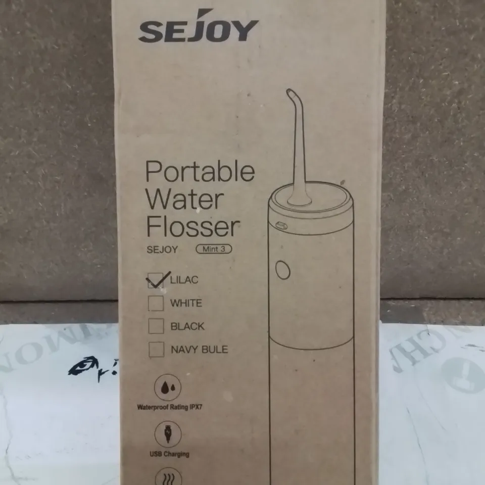 BOXED PORTABLE WATER FLOSSER