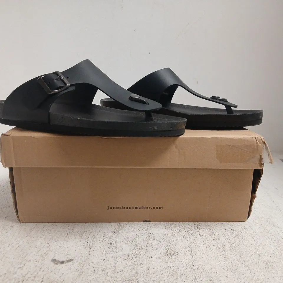 BOXED PAIR OF JONES TOE-POST SANDALS IN BLACK SIZE UK 9