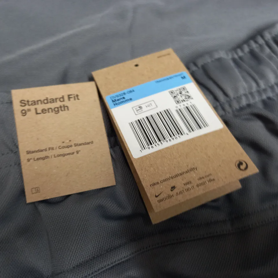 NIKE GREY 9" LENGTH SHORTS - M