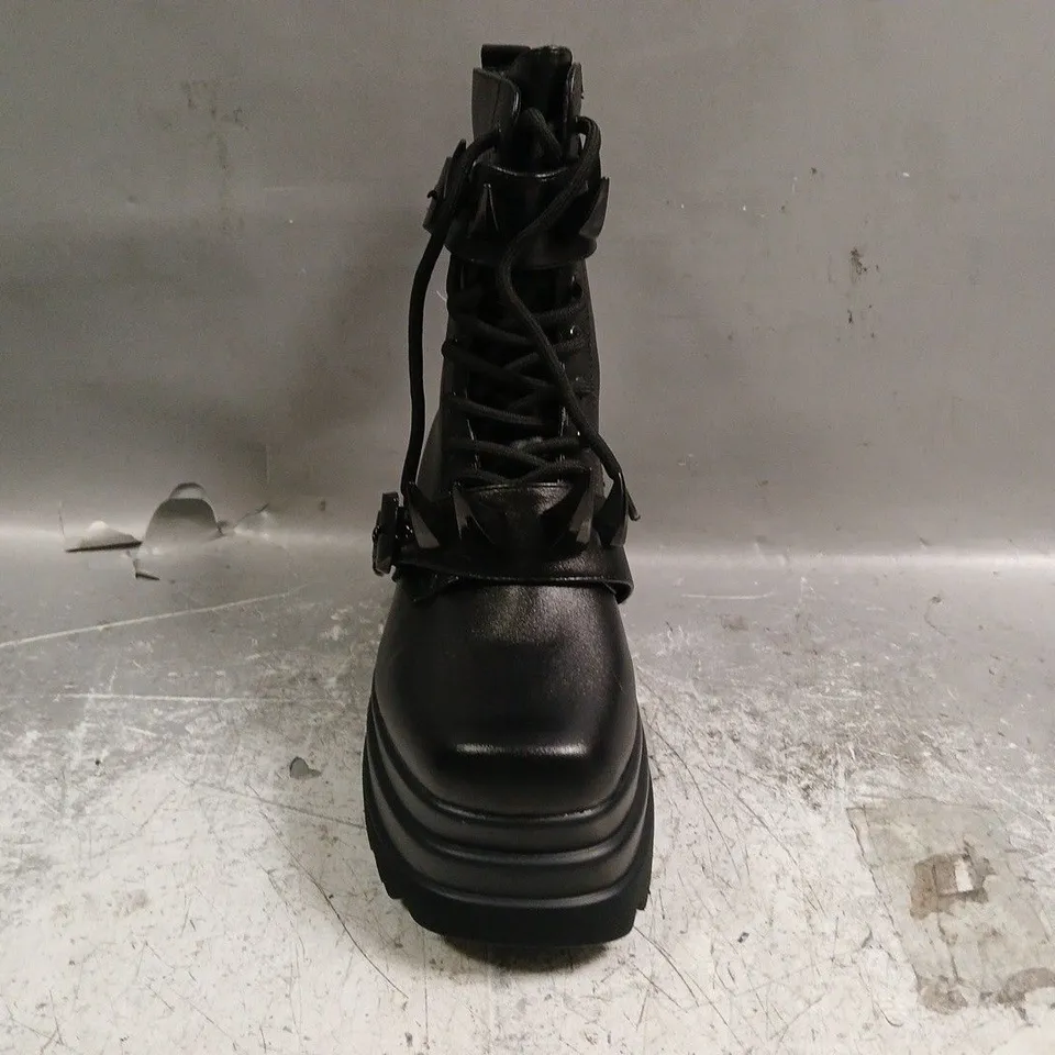 BOXED PAIR OF KOI BOOTS IN BLACK W. SPIKE DETAIL SIZE UK 4