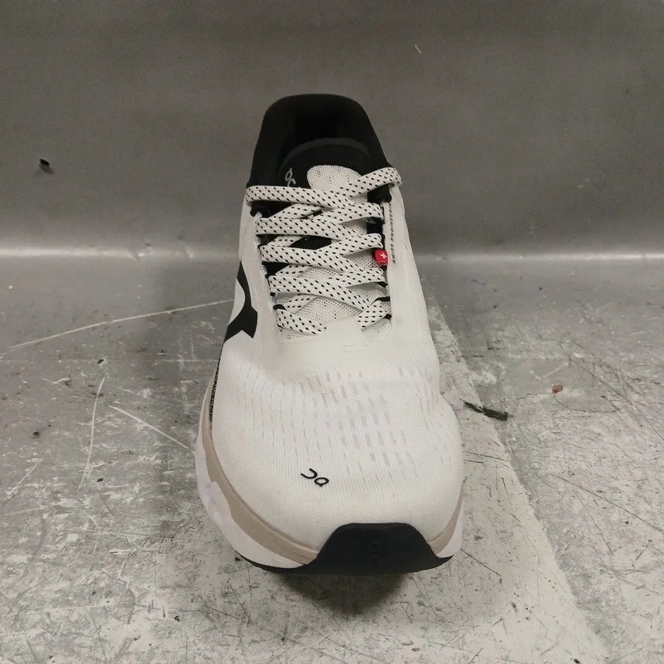 PAIR OF ON CLOUDMONSTER RUNNING SHOES IN WHITE/BLACK SIZE UK 8