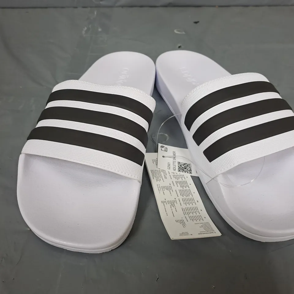 PAIR OF ADIDAS ADILETTE SHOWER SLIDES IN WHITE/BLACK - UK 10