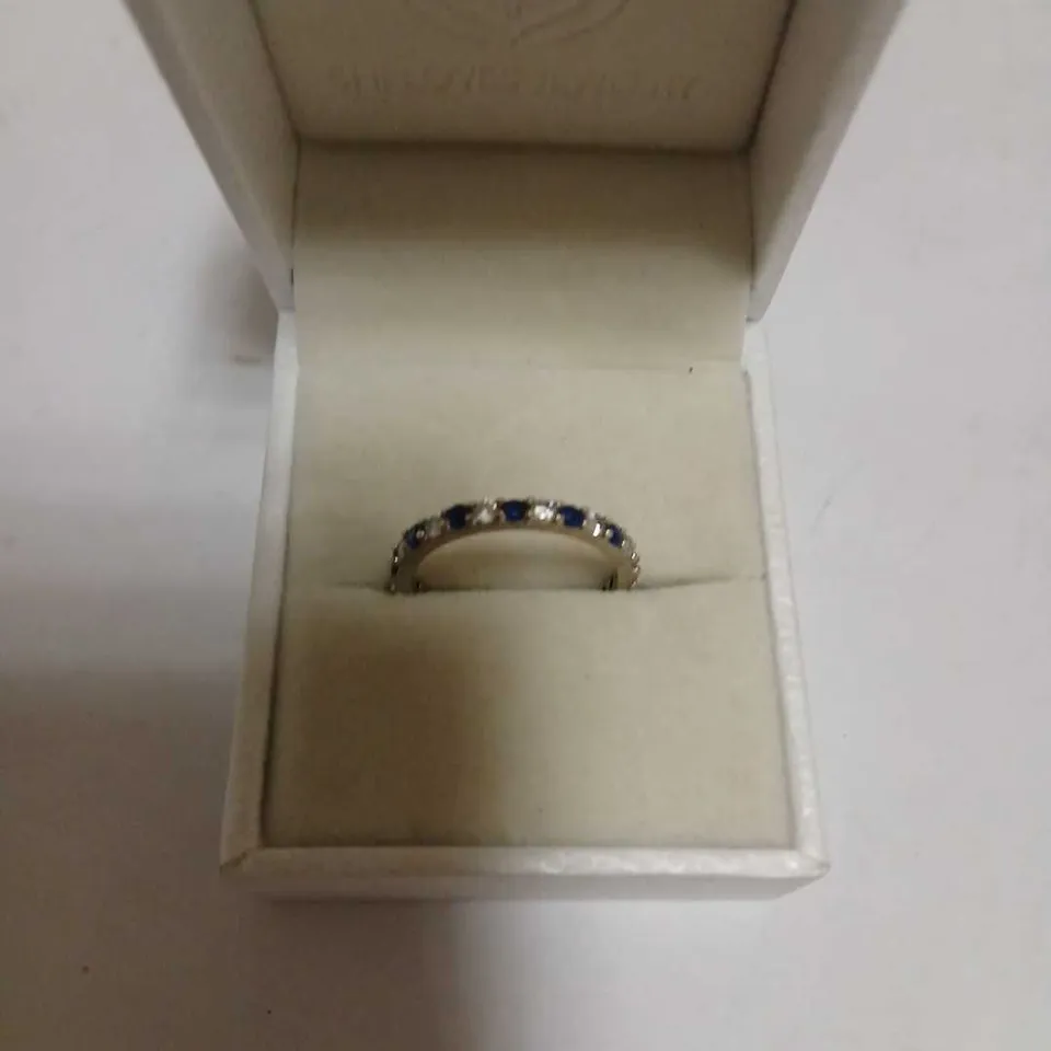 DIAMONIQUE 0.90CT TW SIMULATED GEMSTONE ETERNITY RING STERLING SILVER