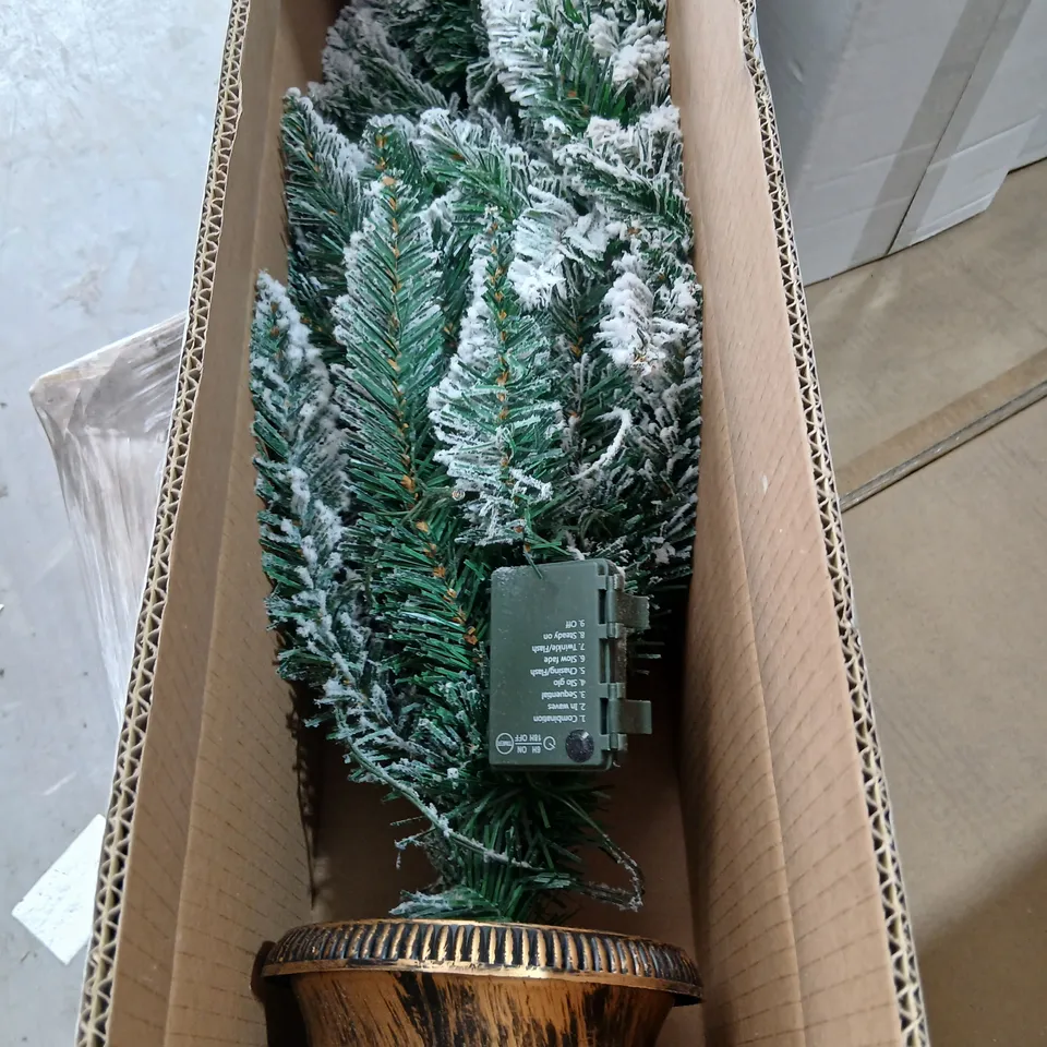 FOUR BOXED CHRISTMAS TREES