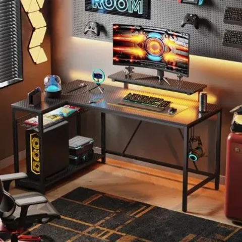 BOXED L-SHAPED COMPUTER DESK WITH POWER OUTLET, GAMING DESK WITH MONITOR STAND AND SHELVES - BLACK (1 BOX)