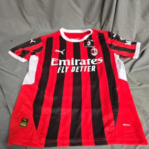 PUMA ACM FOOTBALL SHIRT IN RED/BLACK SIZE S
