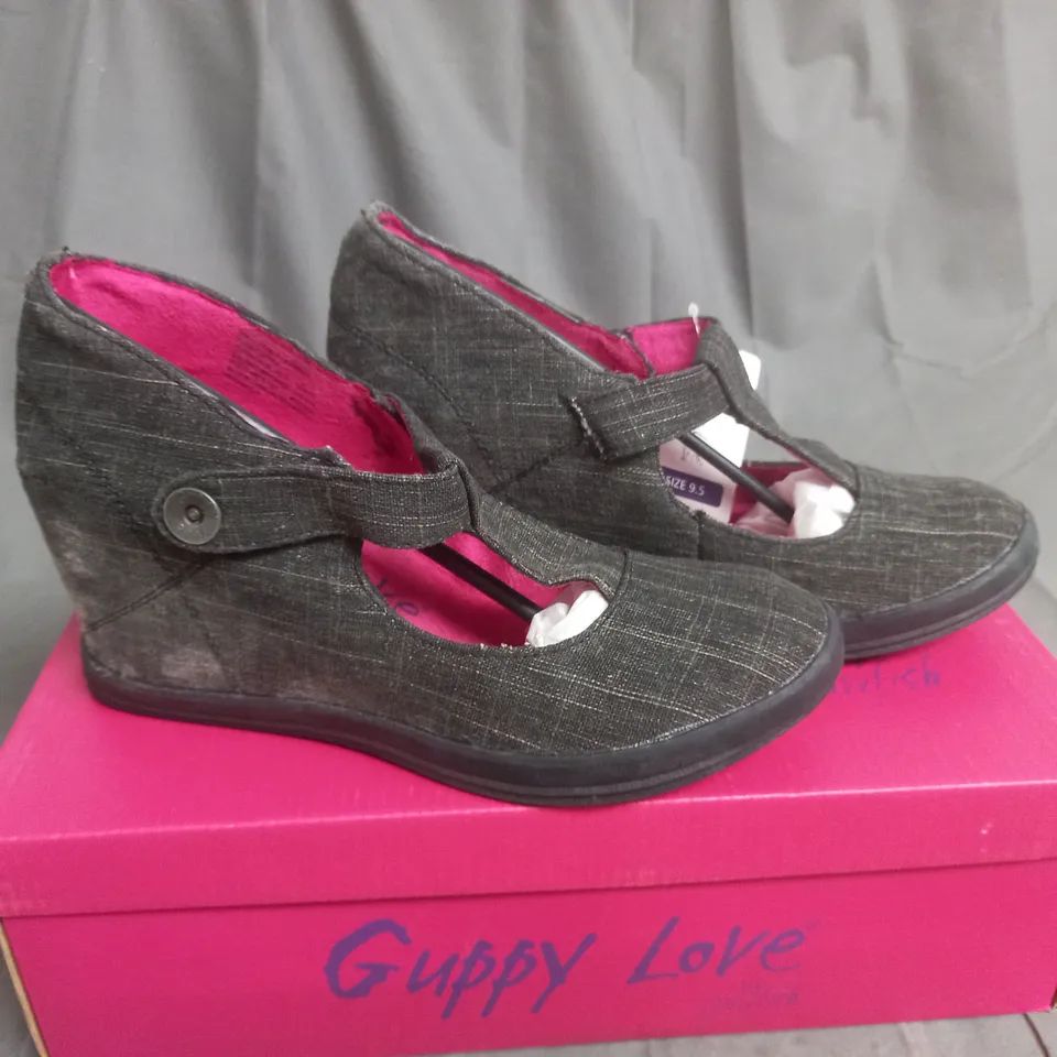 BOX OF APPROXIMATELY 12 BLACK  GUPPY LOVE BY BLOWFISH SHOES IN VARIOUS SIZES 