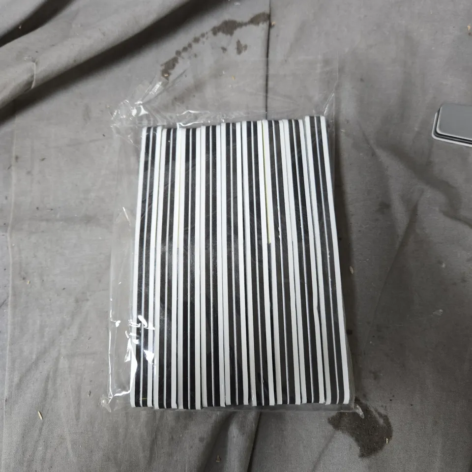 BOX OF APPROXIMATELY 20 GELITE MANICURE TOOL (NAIL FILE) – STRIPED NOTEBOOK IN SEALED PLASTIC