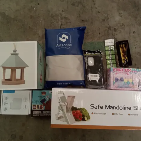 PALLET OF ASSORTED ITEMS INCLUDING SAFE MANDOLINE SLICER, BROWN BEAR LIMESCALE REMOVER, NOTEBOOK AC ADAPTER, BIRD FEEDER, PHONE CASE, BUTTON CELL BATTERIES
