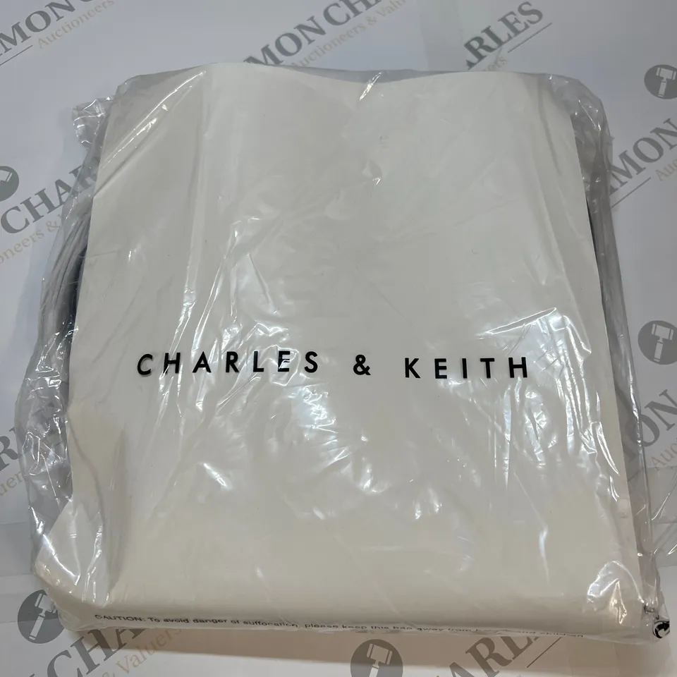 CHARLES & KEITH PETRA CURVED SHOULDER BAG IN BLACK SIZE S