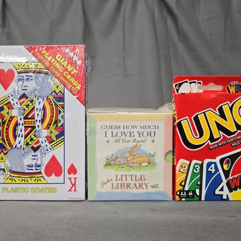 BOX OF APPROXIMATELY 20 ASSORTED TOYS AND GAMES TO INCLUDE GIANT PLAYING CARDS, UNO, ETC - COLLECTION ONLY