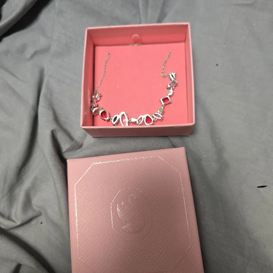 SILVER-TONE NECKLACE WITH GEOMETRIC RED GEMSTONE ACCENTS – IN PINK PRESENTATION BOX
