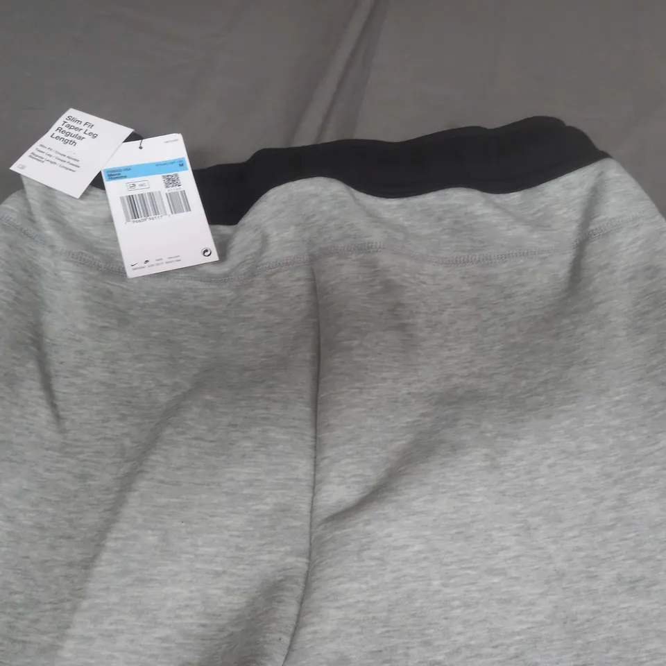 NIKE SLIM FIT TAPER LEG TRACKSUIT - M