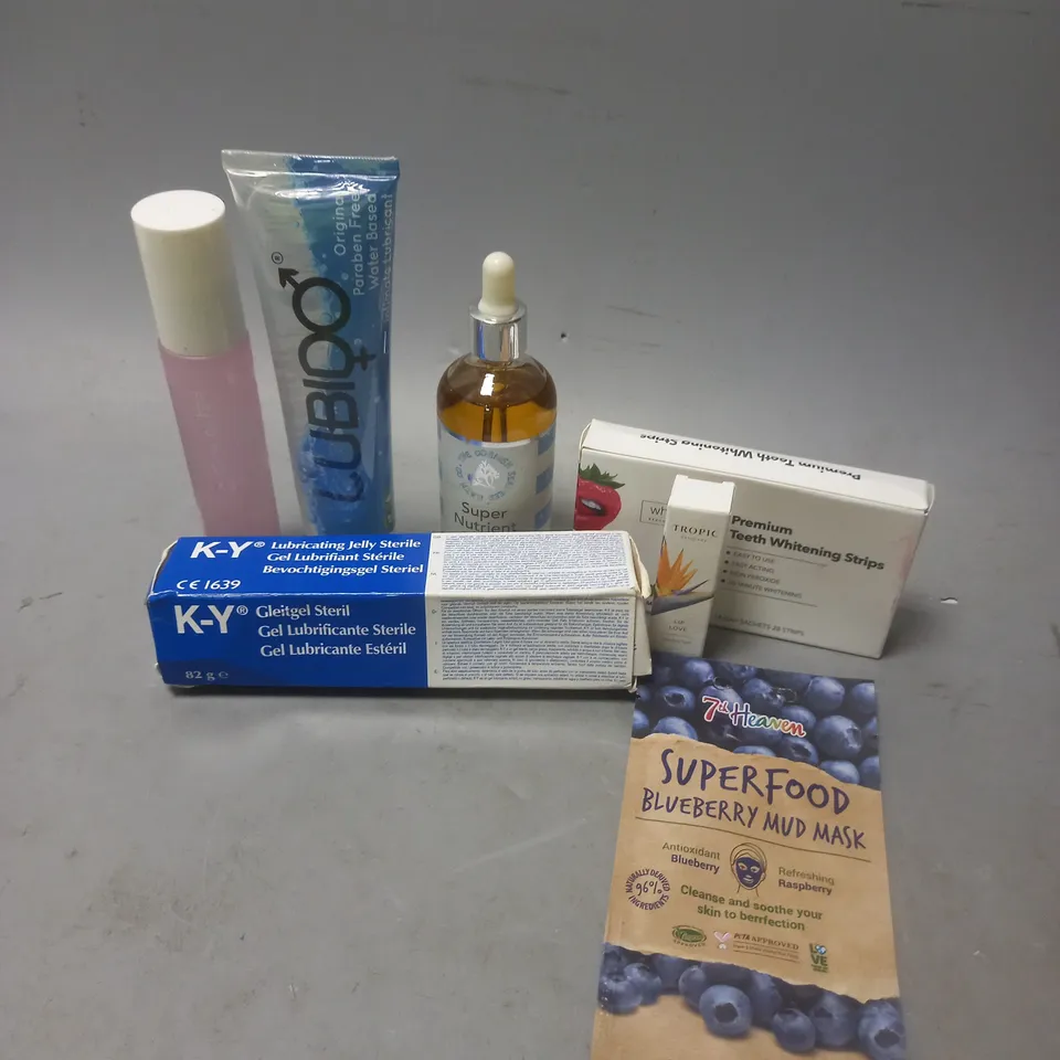 APPROXIMATELY 15 ASSORTED COSMETICS PRODUCTS TO INCLUDE - LUBIDO LUBRICANT - PREMIUM TEETH WHITENING STRIPS - 7TH HEAVEN MUD MASK - ETC