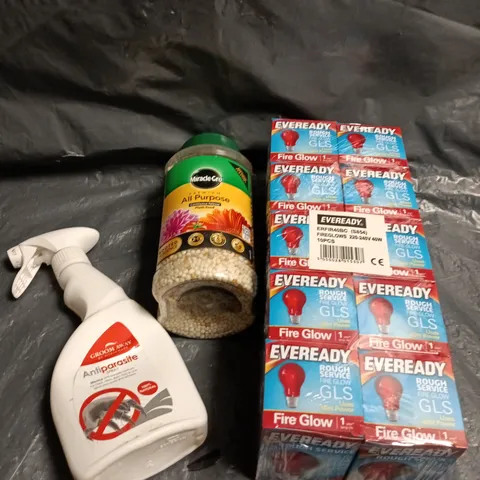 APPROXIMATELY 6 ASSORTED HOUSEHOLD ITEMS TO INCLUDE FIRE GLOW BULBS, PLANT FOOD, PARASITE SPRAY ETC 