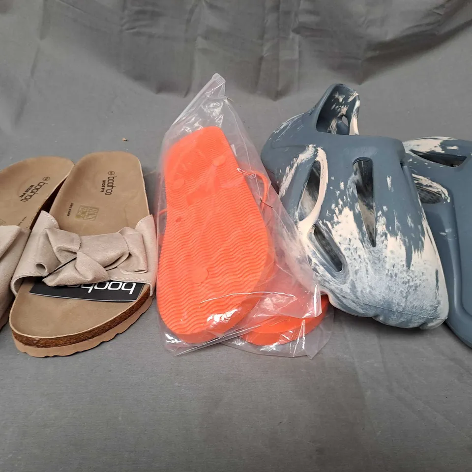 APPROXIMATELY 15 ASSORTED FOOTWEAR RELATED ITEMS IN VARYING STYLE/SIZE/COLOUR TO INCLUDE: TRAINERS, HEELS, SLIP ONS, ETC