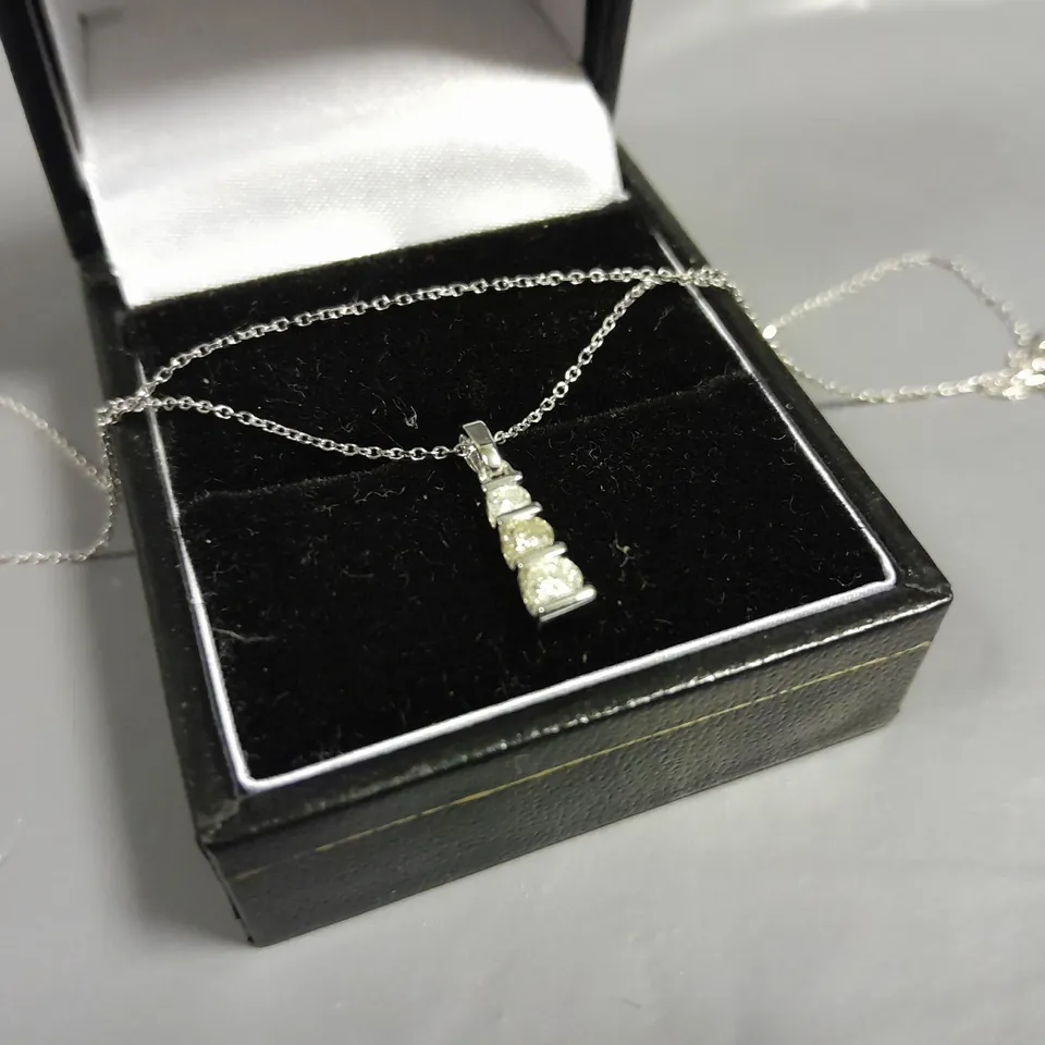 14CT WHITE GOLD PENDANT ON A CHAIN SET WITH NATURAL DIAMONDS