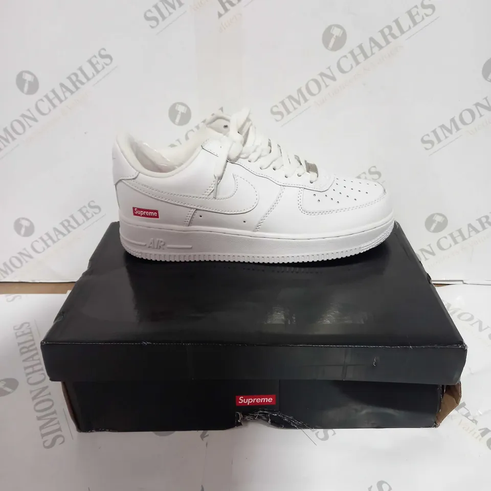 BOXED PAIR OF SUPREME/NIKE WHITE AIR FORCE ONES SIZE 6