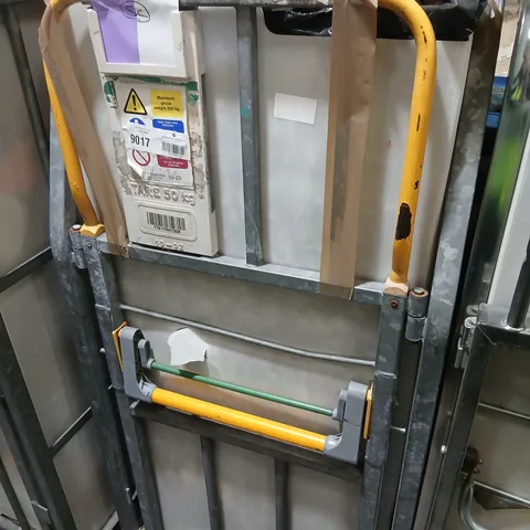 LARGE CAGE OF ASSORTED UNPROCESSED RAW RETURN DESIGNER CLOTHING